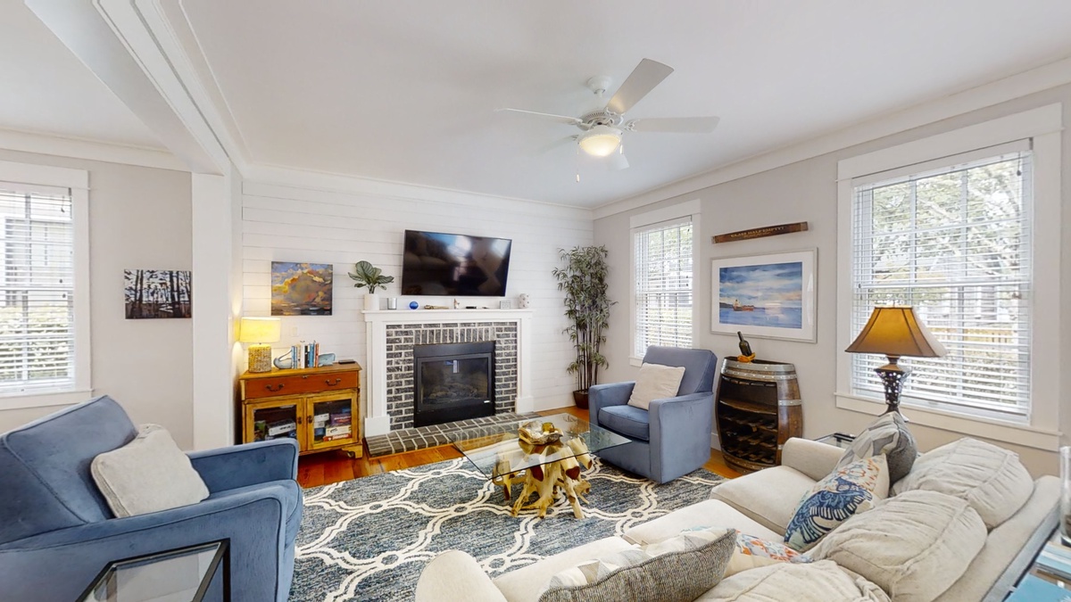 Shore to Please living room with gas fireplace